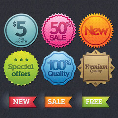 Fototapeta premium Set of six colorful promotional badges and three ribbon tags for commercial retail sales and special offers on a dark textured background