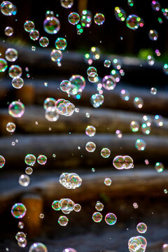 Iridescent soap bubbles floating outdoors in W�rzburg