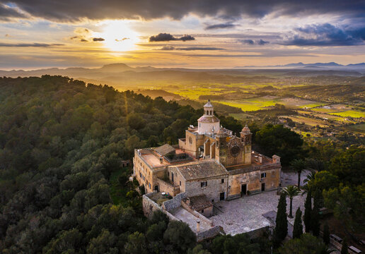 Spain, Balearic Islands, Petra, Drone view of Santuari De La Mare De Deu De Bonany at sunset