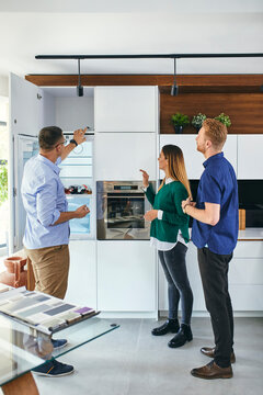 Couple shopping for a new kitchen in showroom