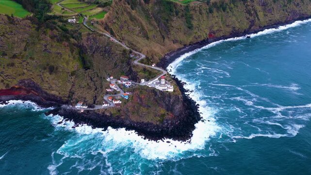 Aerial View Of Ponta do Arnel Lighthouse (Farol do Arnel) At Sunrise In Sao Miguel, Azores, Portugal.