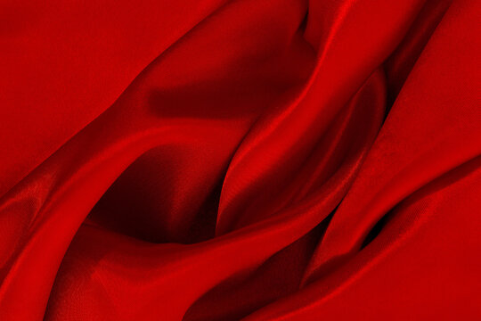 Dark blue fabric texture background, detail of silk or linen pattern.