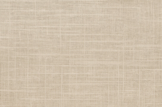 Brown linen fabric cloth texture for background, natural textile pattern.