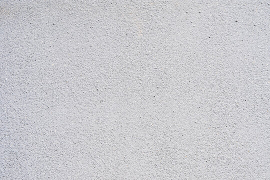 Bright grey gray white stone sandblasted concrete wall texture background banner backdrop