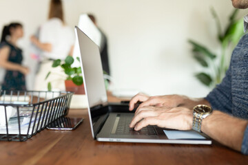 Fototapeta premium Modern workspace with focused typing.