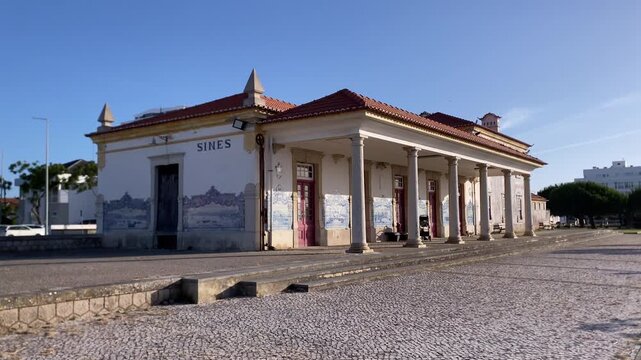 Sines, Portugal name forming a pattern on classic Portuguese cobblestone pavement, reflecting local heritage and coastal travel