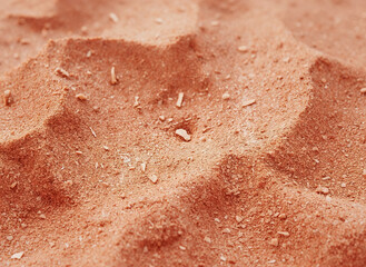 Fototapeta premium Closeup pink sand ripples textured surface