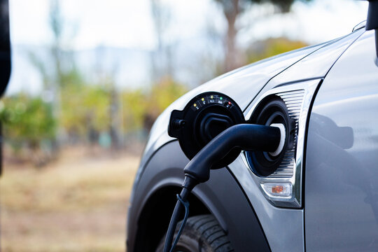 EV plugged into electric vehicle destination charging point in Hunter Valley winery region