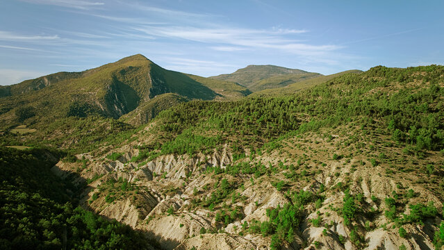 Montagne de Vic: Green Peaks and Eroded Slopes
Montagne de Vic landscape featuring green summits and arid erosion. This high-quality image showcases the diverse topography of the French mountains
