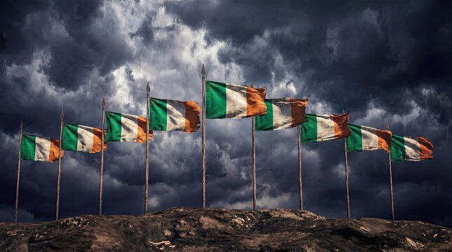 Irish flags on wooden poles atop rocky hill national pride historical heritage
