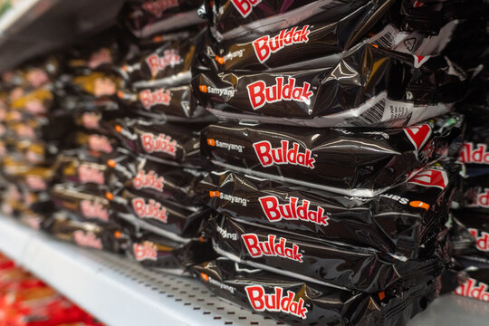 Villa de Alvarez, Colima. Mexico. June 24, 2026: Stacks of Samyang Buldak Instant Ramen Packages Displayed on a Supermarket Shelf