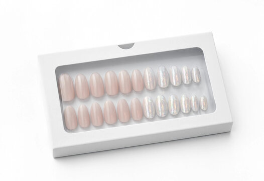 Collection of light nude press-on nails in white retail box with press on press-on manicure cosmetic packaging