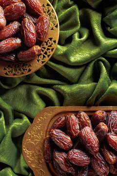 Dates on a golden platter.