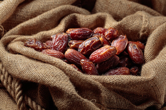 Dates in burlap bag.