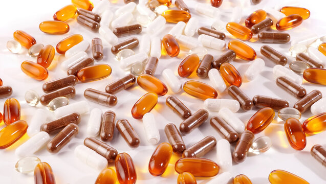 Food and Health - Various white, orange and transparent Capsules