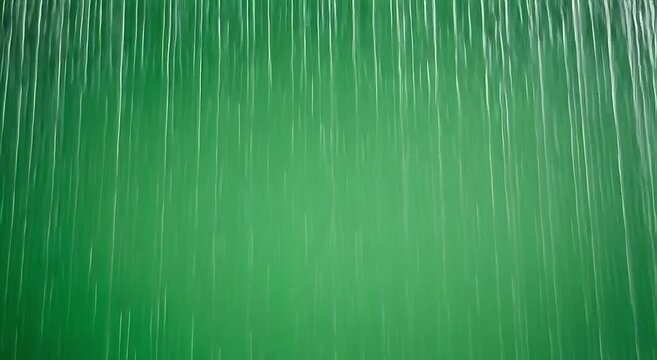 Waterfall motion background featuring cascading green water streams falling in a rhythmic pattern creating a peaceful natural video effect