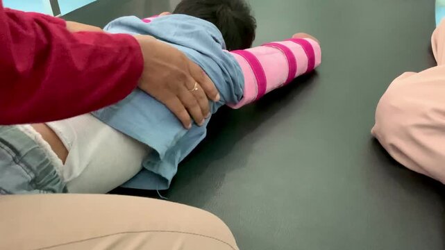 Pediatric Physiotherapy for child living with Cerebral Palsy in Prone Position with Arm Splint