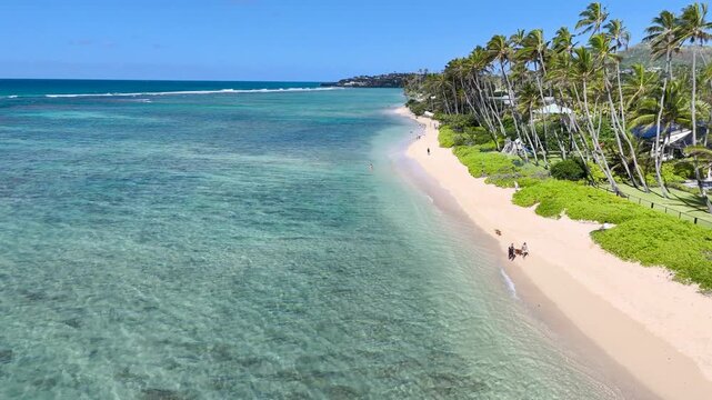 Aerial view of scenic Kahala beach with calm turquoise water in Oahu, Hawaii