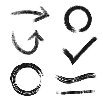 Set of hand-drawn brush strokes, arrows, and circles vector elements