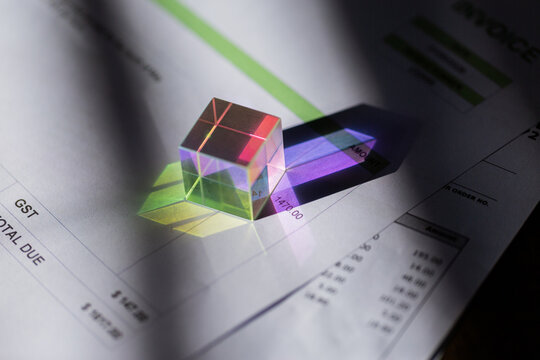 colourful paperweight on invoices including GST