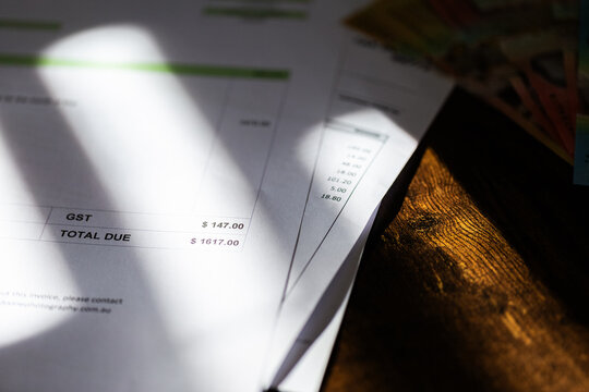 tax invoices on desk small business accounting concept with GST
