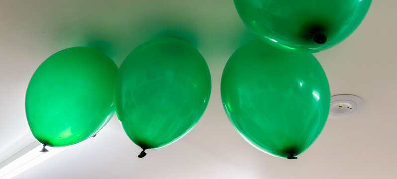 Birthday balloons with green colour