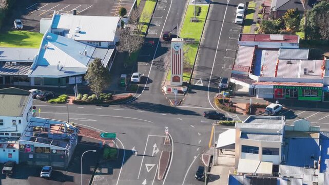 TE AROHA, NEW ZEALAND, 11 July 2026 &ndash; An aerial view of the main street in Te Aroha, New Zealand, showing the town's clock tower and surrounding businesses on a sunny day.