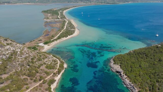 Aerial view of Sykia beach and Chrisi Ammos beach on a sunny day near famous Voidokilia Beach, Pilos, Messinia
