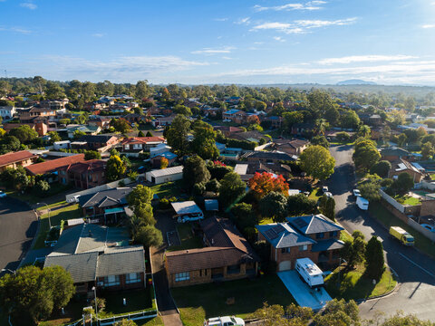 Buildings and streets with view over rooves of Singleton Heights on sunlit morning