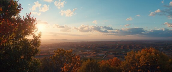 Fototapeta premium Autumn Landscape View with Sunset Lighting - Rolling Fields, Warm Colors, Panoramic Scene