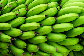 Banana on white background, Fresh green banana bunch © Kiran