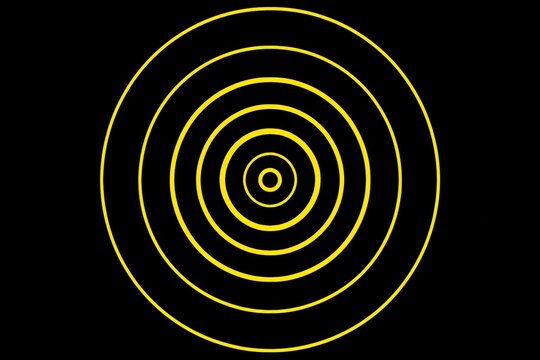Concentric yellow circles on black background, varying in size like sound waves.
