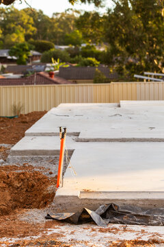 concrete house slab base poured and ready for new build on worksite