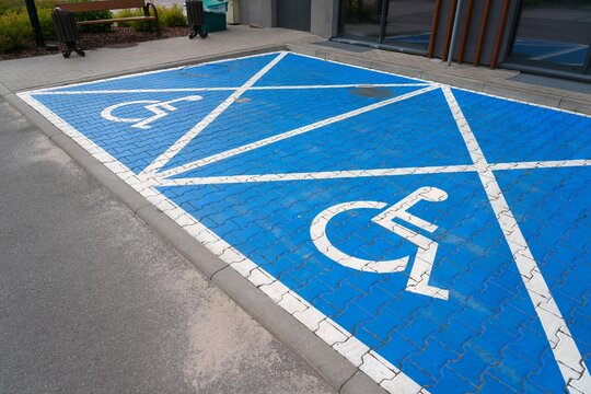 Accessible parking space. Disabled street parking spot in Katowice city, Poland.