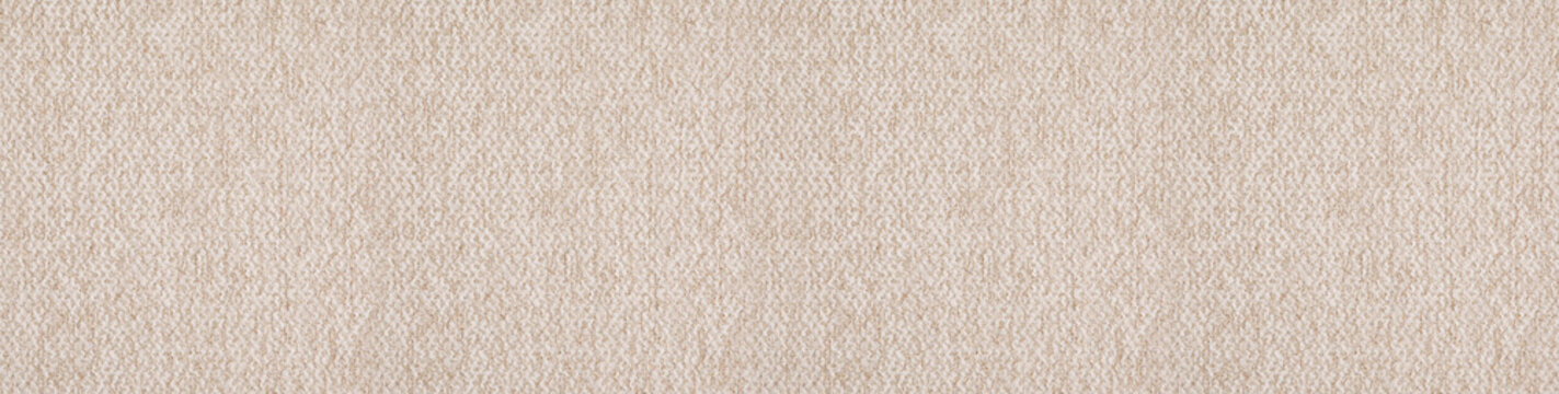 Close up shot of beige boucle fabric texture with textured grain
