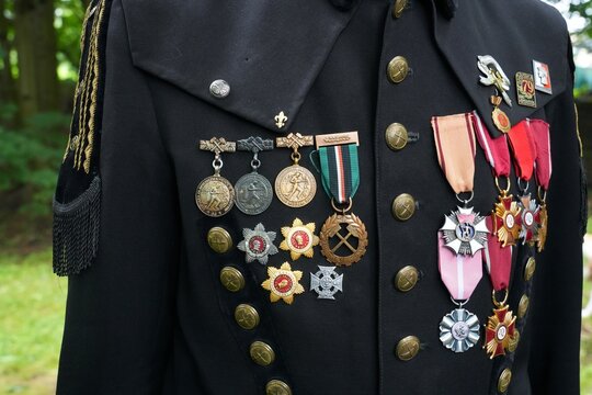 TARNOWSKIE GORY, POLAND - JULY 12, 2026: Miner uniform with assorted medals for work anniversaries and achievements, presented at 500th anniversary celebration of Tarnowskie Gory town.