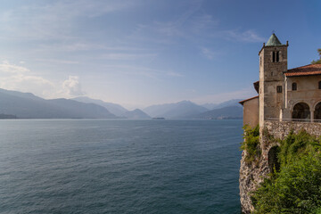 Naklejka premium Hermitage of Santa Caterina del Sasso on Cliff of Lake Maggiore Italy