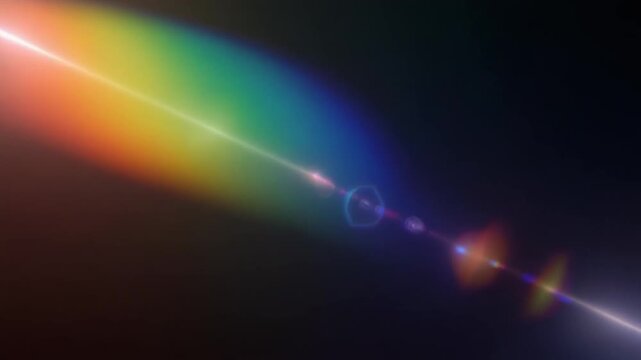 Elegant rainbow prism cinematic light leak overlay with spectral gradients, realistic lens flare, diffraction colors and seamless looping motion for premium video editing on dark background.