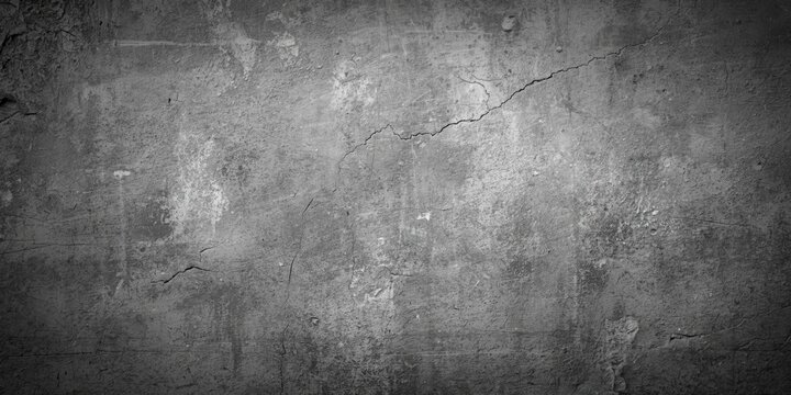 Textured Gray Concrete Wall with Cracks and Imperfections