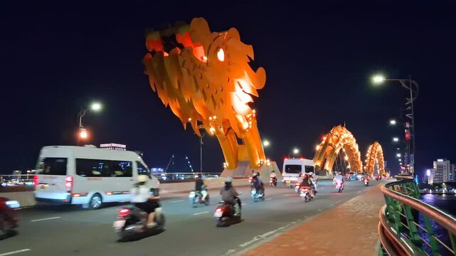 Da Nang, Vietnam - July 09 2026: The Dragon Bridge illuminated at night.