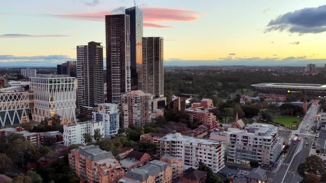 West to east aerial panorama of Parramatta city CBD towers on riverbank in West Sydney.