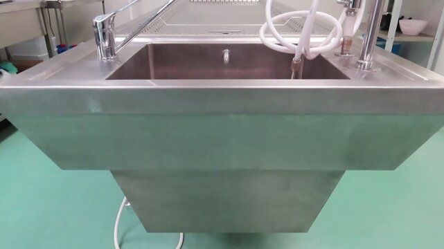 Autopsy table in morgue stainless steel forensic examination table hospital mortuary room