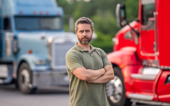Man trucker driver near lorry truck. Transportation vehicles. Semi trucks vehicle. Hispanic man trucker. Hispanic man driver in front of truck. Trucking owner. Truck driver. Freight route run