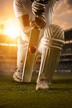 Cricket batter blocking fast red ball with defensive stroke during golden sunset stadium match. Concept of cricket defense, tournament play, athletic precision, sports branding and commercial promo.
