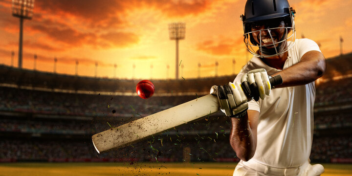 Cricket batter driving red ball with powerful swing during dramatic sunset stadium match. Concept of professional cricket, sports performance, tournament promotion, athletic excellence and branding.