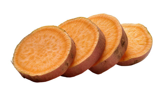 Isolated sweet potato slices, raw whole food, healthy vegan ingredient, freshly cut pieces