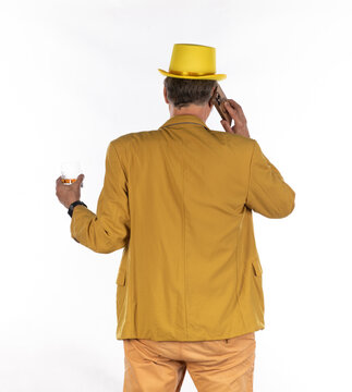 Businessman man in yellow suit back view isolated on white background