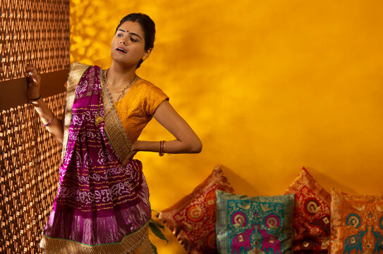Portrait of married Gujrati woman looking outside