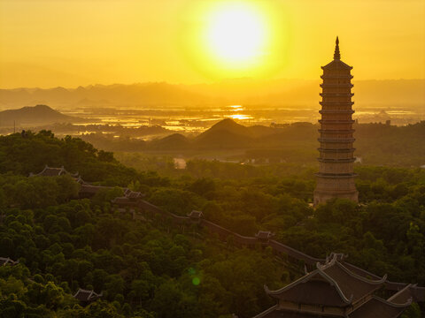 Aerial view of Bai Dinh pagoda and mountains at sunset in Ninh Binh province, Vietnam