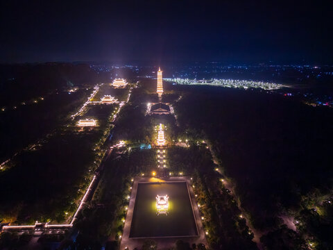 Aerial view of Bai Dinh pagoda and mountains at night in Ninh Binh province, Vietnam